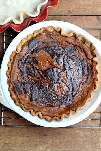 Overhead image of chocolate swirled pumpkin pie