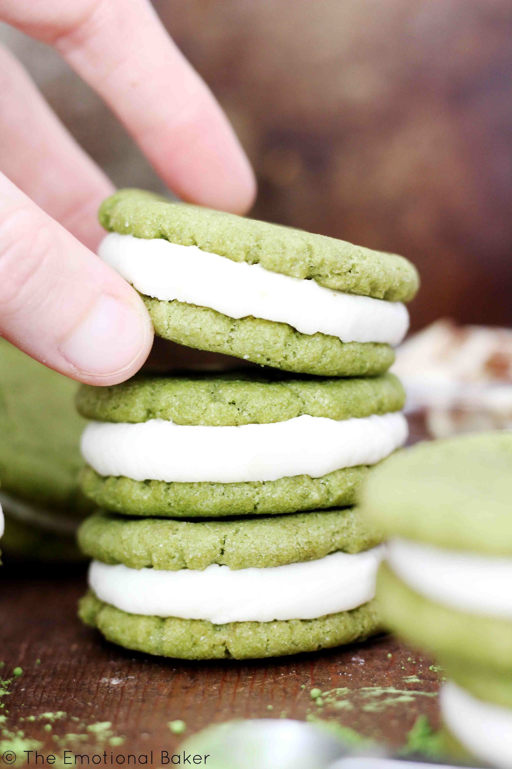 Matcha Almond Sandwich Cookies -- Green tea cookies flavored with almond and paired with a creamy frosting.