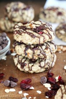 Cranberry Pecan Oat Cookies -- A guilt free cookie sweetened with maple syrup and packed with oats, cranberries, pecans, and chocolate!