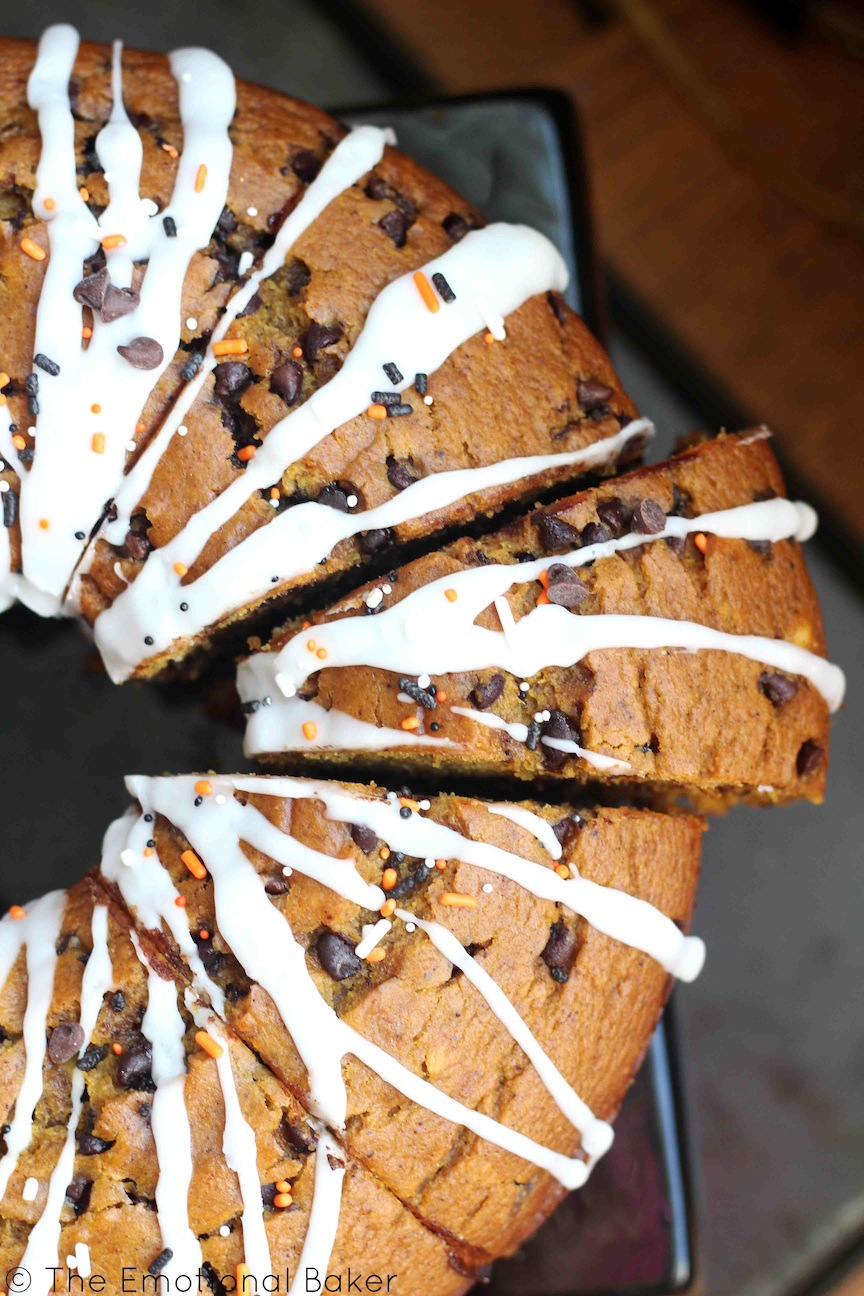 This Vegan Pumpkin Chocolate Chip Bundt Cake is perfectly spiced, filled with chocolate and topped with a simple icing.