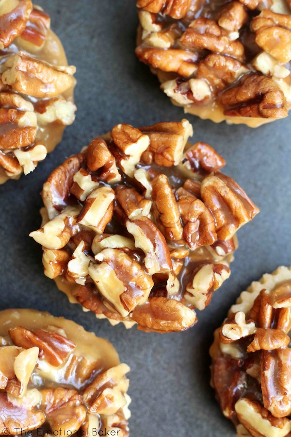 Have pecan pie in cookie form! These Pecan Pie Shortbread Cookies feature a buttery crust and are topped with maple caramel pecans.