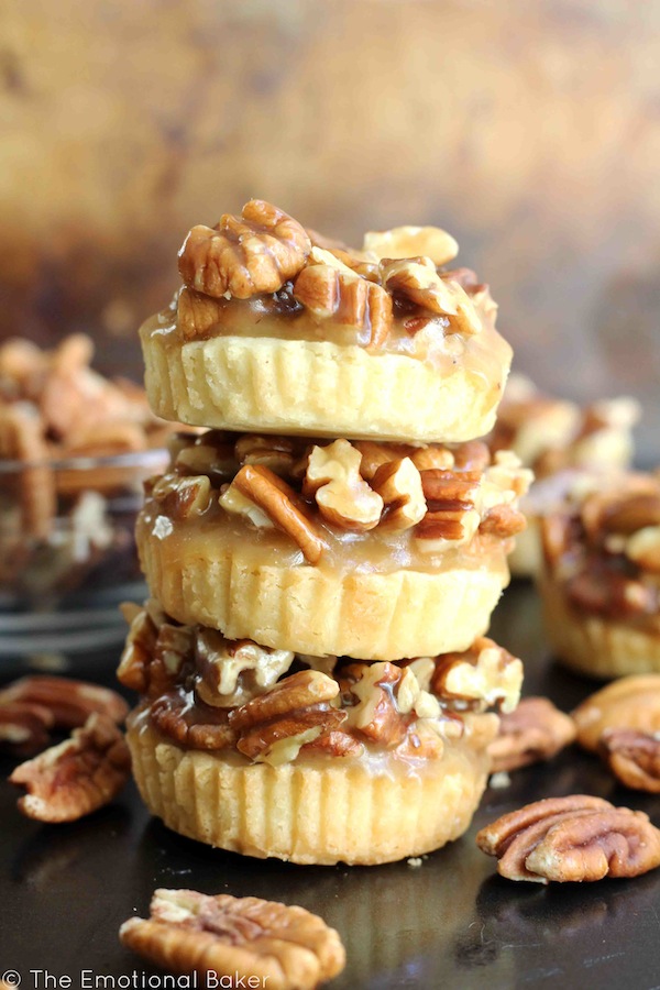 Have pecan pie in cookie form! These Pecan Pie Shortbread Cookies feature a buttery crust and are topped with maple caramel pecans.