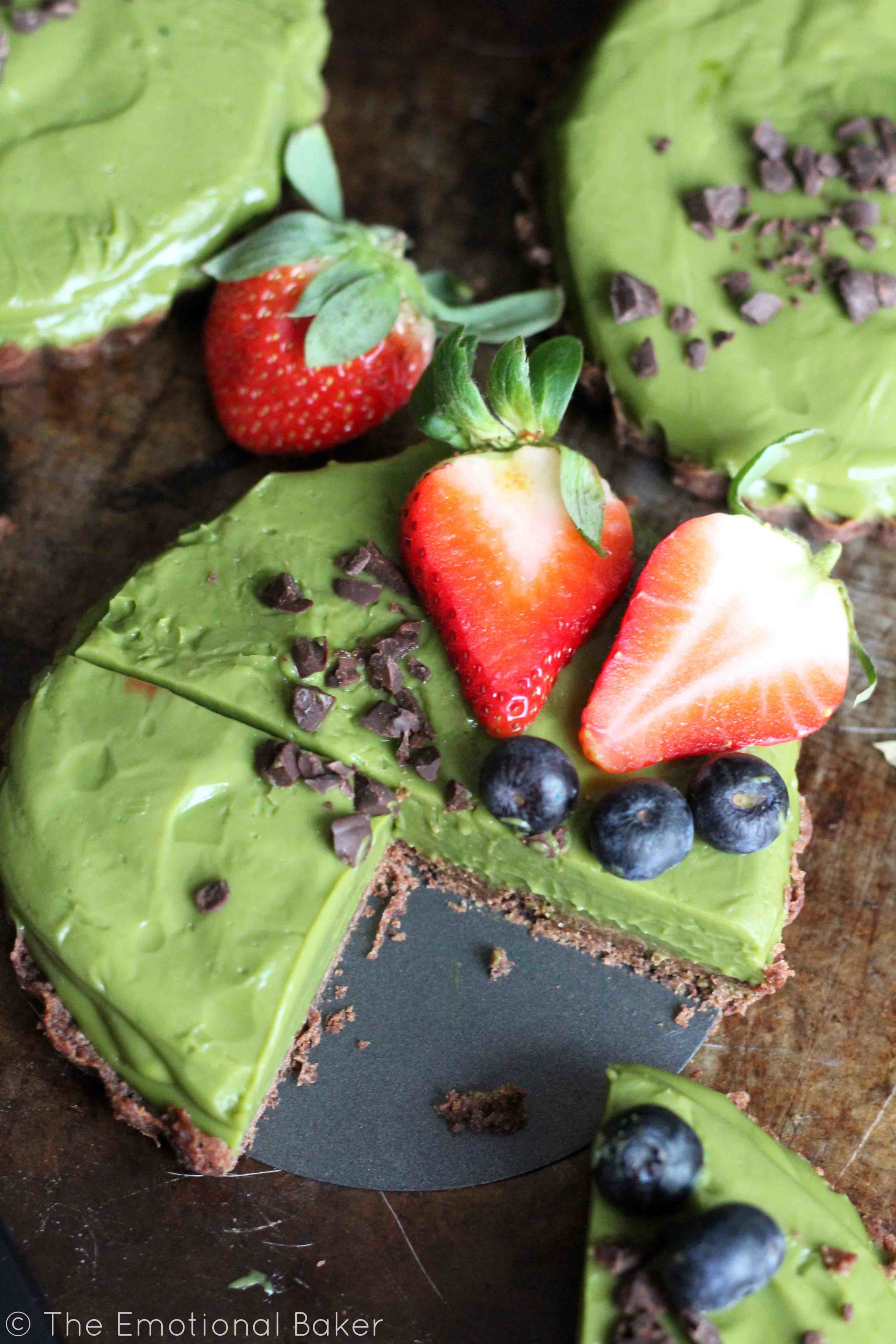 This Matcha Tart is secretly healthy! It's vegan, sweetened with coconut sugar and maple syrup and has a whole wheat chocolate crust.