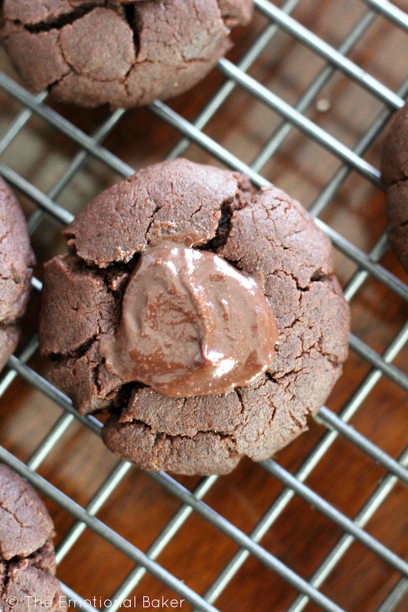 Chocolate Cookies get an update with a luscious Chocolate Tahini filling. You'll love these Chocolate Tahini Thumbprint Cookies!