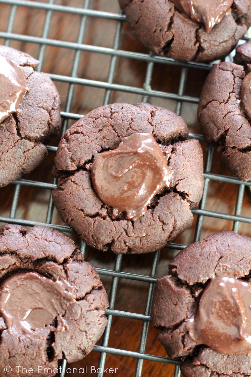 Chocolate Cookies get an update with a luscious Chocolate Tahini filling. You'll love these Chocolate Tahini Thumbprint Cookies!