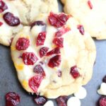 These Cranberry Bliss Cookies are inspired by the popular holiday bar. They are packed with cranberries, white chocolate, citrus and a touch of ginger.