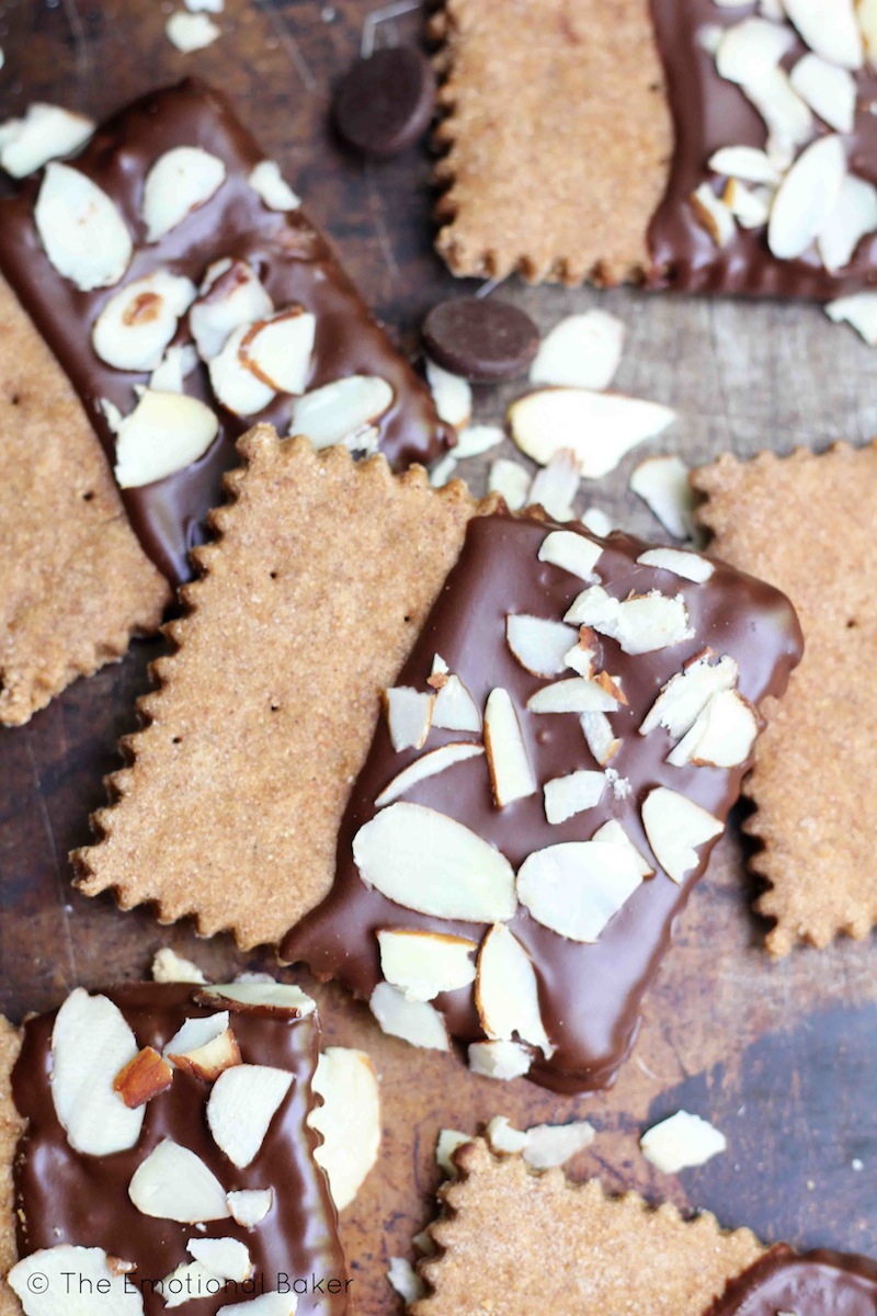 These low sugar, whole wheat Almond Butter Graham Crackers make a perfect snack. If you have a sweet tooth, dip these in dark chocolate for an indulgent healthy treat.